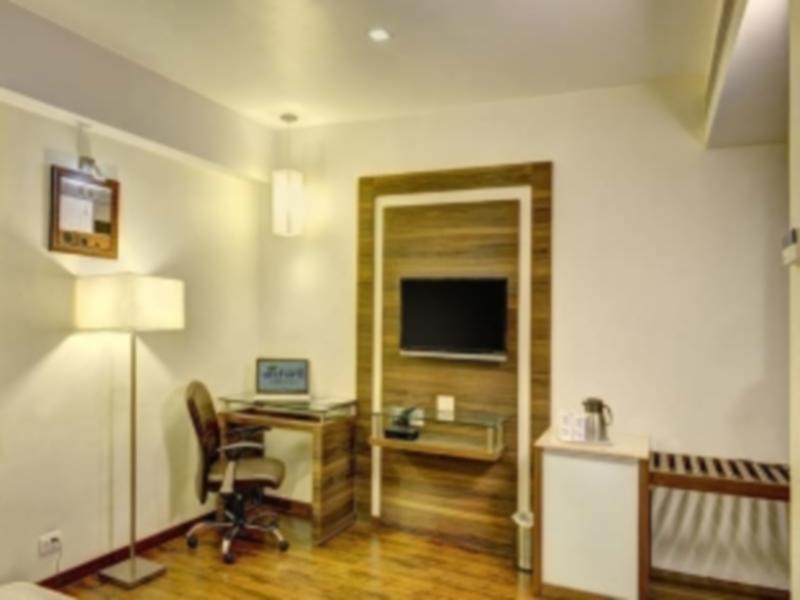 Hotel Aaram Orchard อาเมดาบัด ภายนอก รูปภาพ