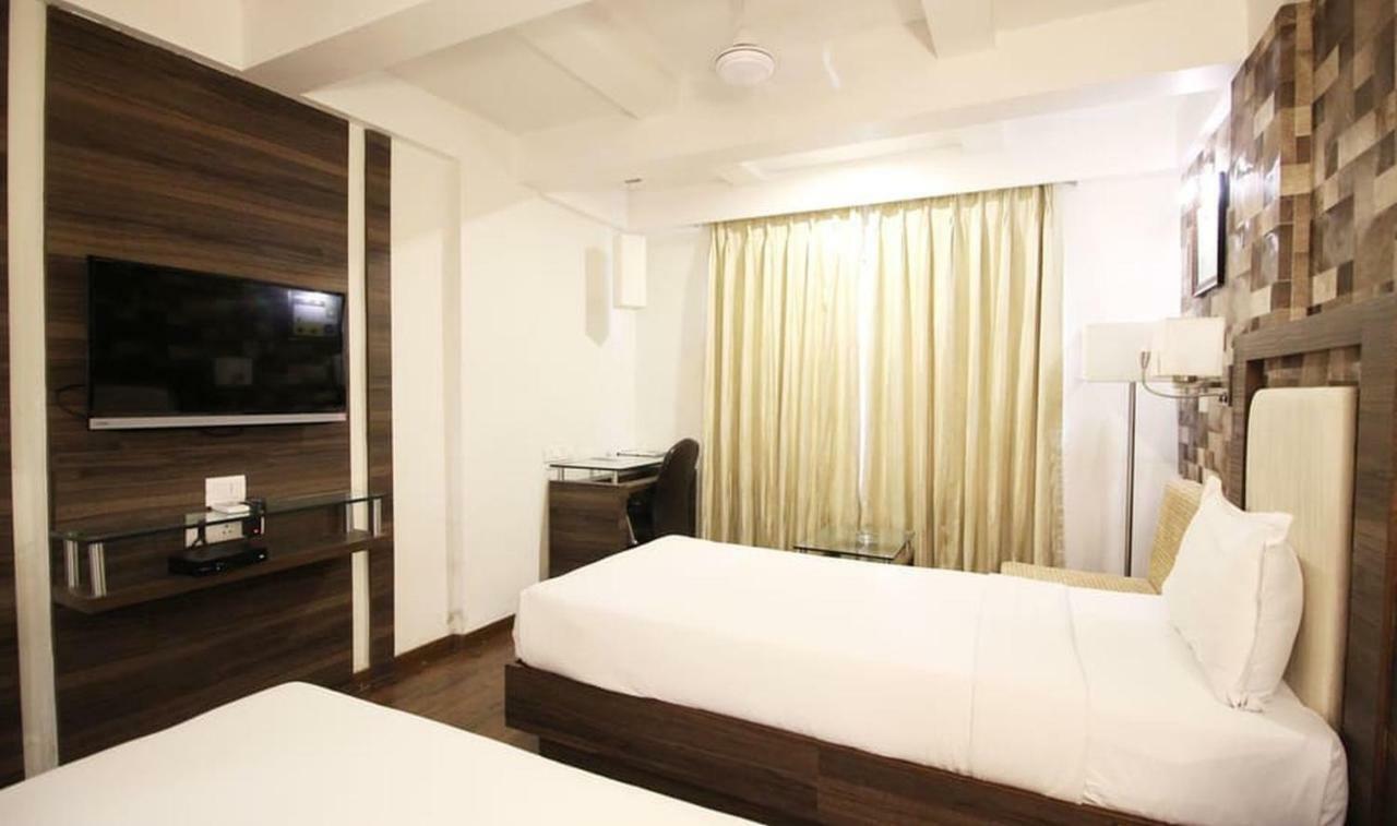 Hotel Aaram Orchard อาเมดาบัด ภายนอก รูปภาพ